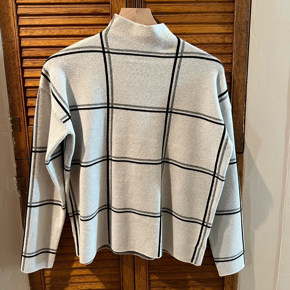 I am selling a size Small Tahari sweater